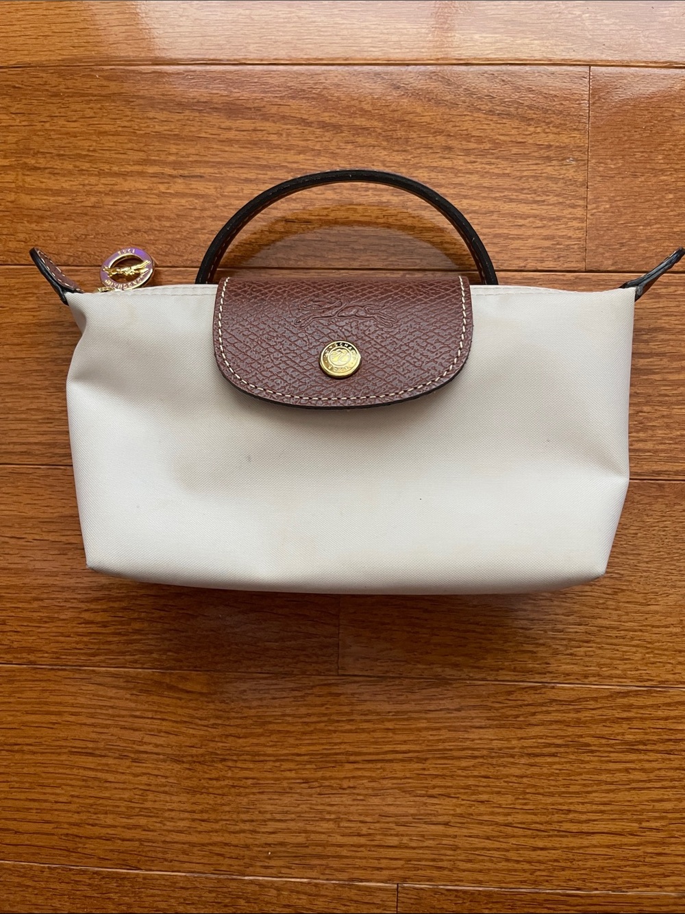 Longchamp Le Pliage Original Mini Pouch in “Paper/Gold”